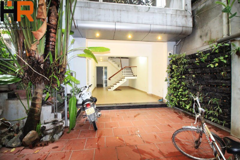 Charming House in Dang Thai Mai for rent with 5 bedrooms, yard, and basic furniture 