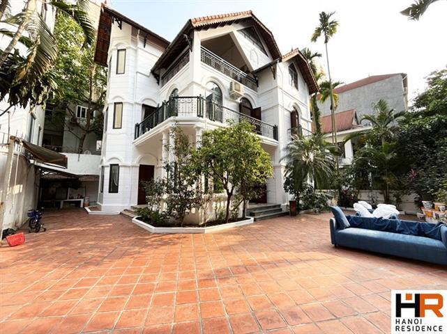 Partly furnished spacious 4 bedroom villa for rent on To Ngoc Van street with big yard